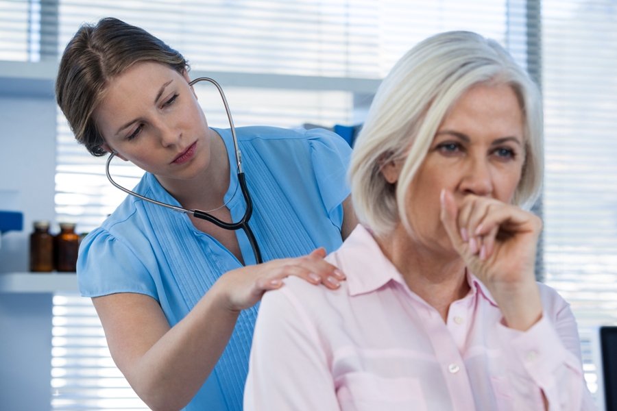 Woman being examined for co-infections with Babesiosis and Lyme disease