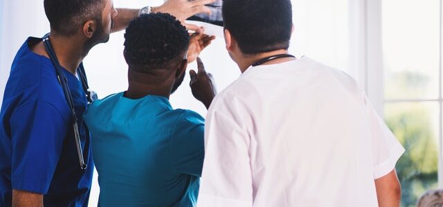 doctors reviewing x-rays