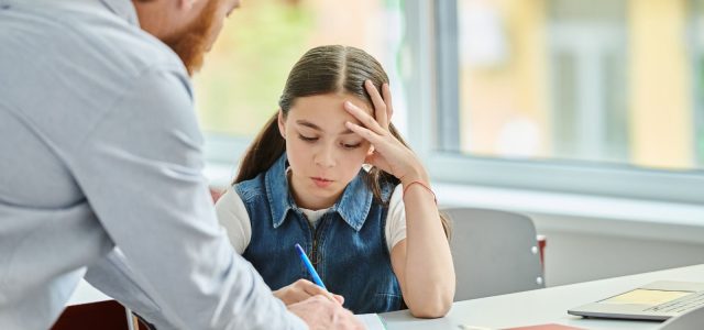 child struggling with schoolwork due to Lyme disease brain fog and fatigue