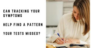 Woman writing in a notebook at home to keep track of her symptoms